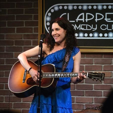 Lahna Turner in a comedy club show